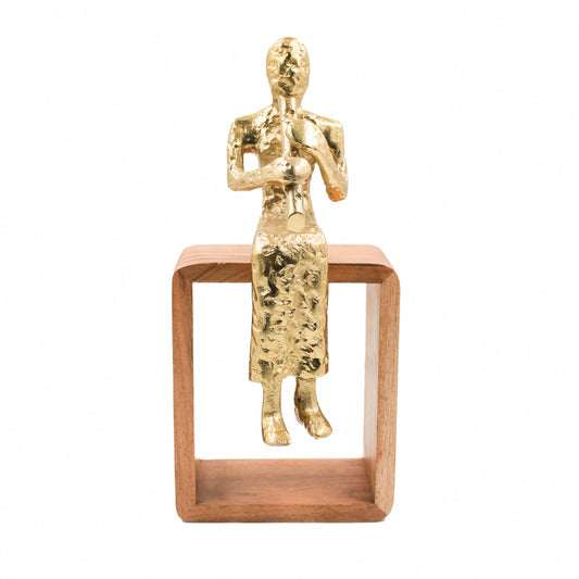 Sitting musician flute gold