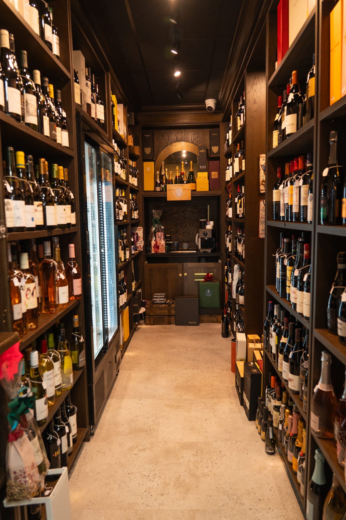 The wine room in the shop in Dunshaughlin, shelved floor to ceiling on both sides